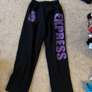 Express Cheer black sweatpants with purple lettering